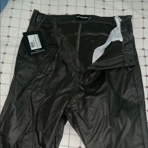 Women’s Forest Green Faux Leather Pant

It’s a very dark green but looks black